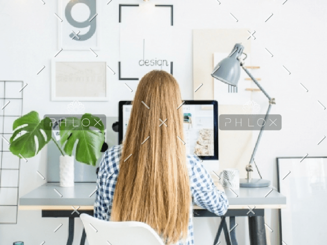 demo-attachment-928-happy-lady-sitting-in-office-coworking-while-P5AFND8